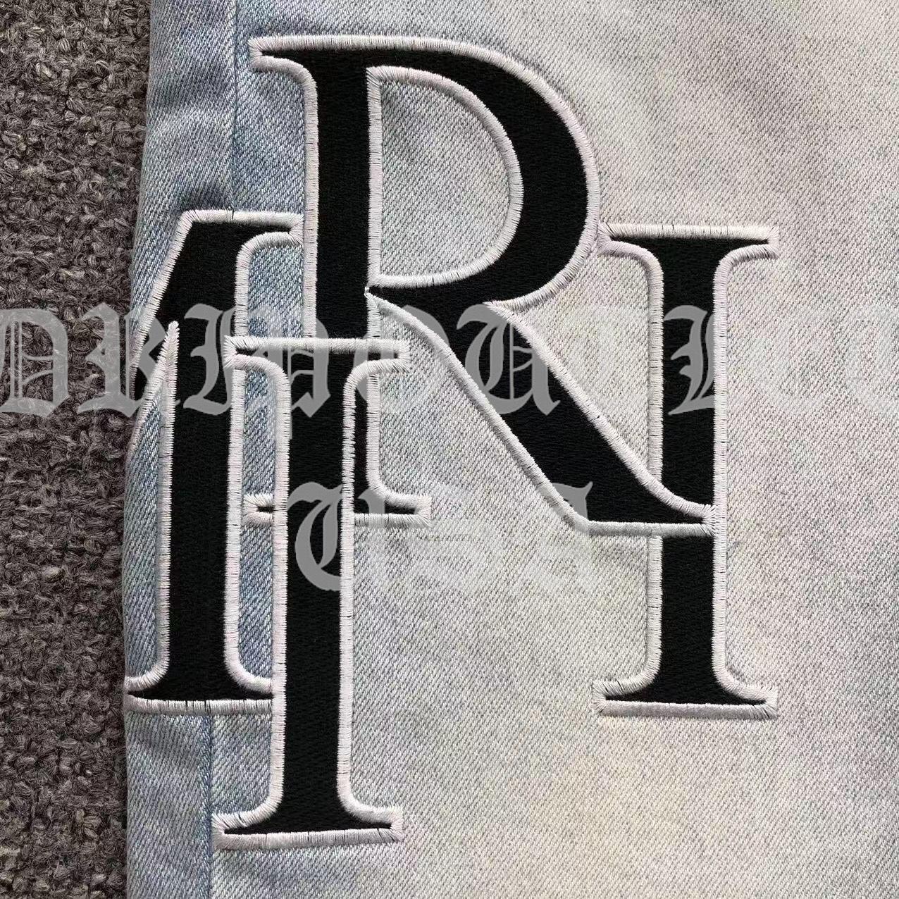 Amiri Blue Bleached Distressed Logo Skinny Jeans