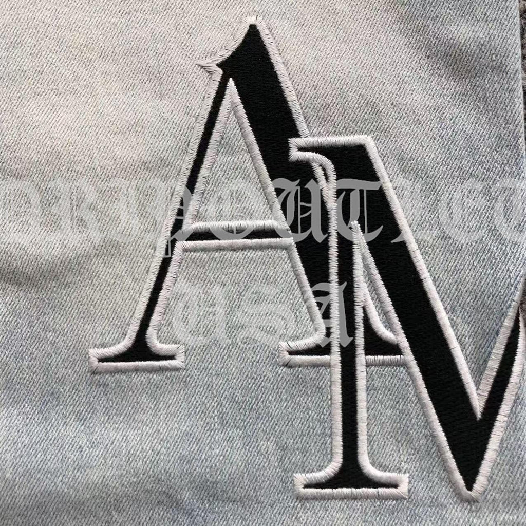 Amiri Blue Bleached Distressed Logo Skinny Jeans