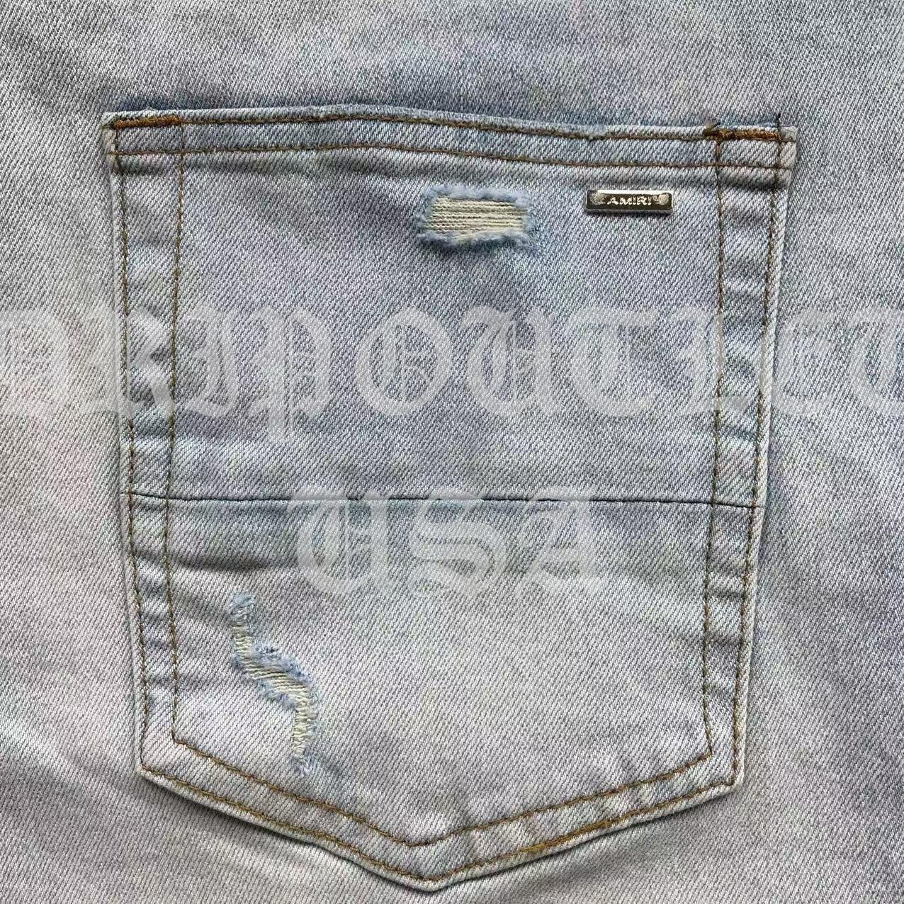 Amiri Blue Bleached Distressed Logo Skinny Jeans