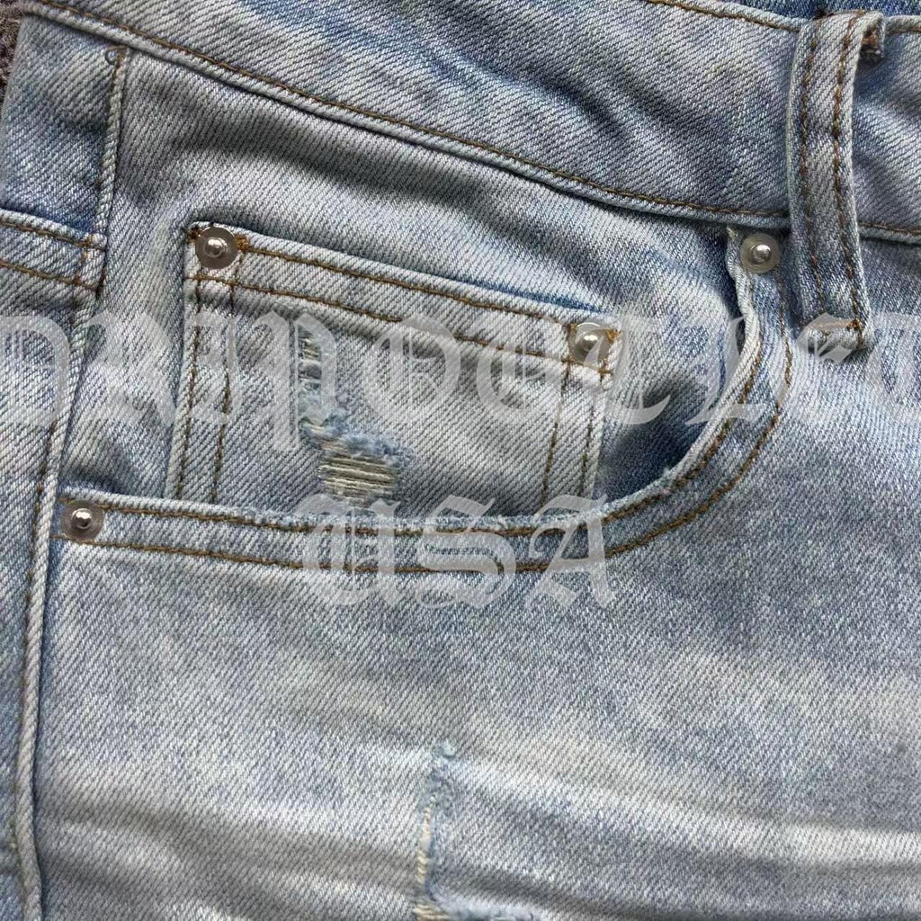 Amiri Blue Bleached Distressed Logo Skinny Jeans