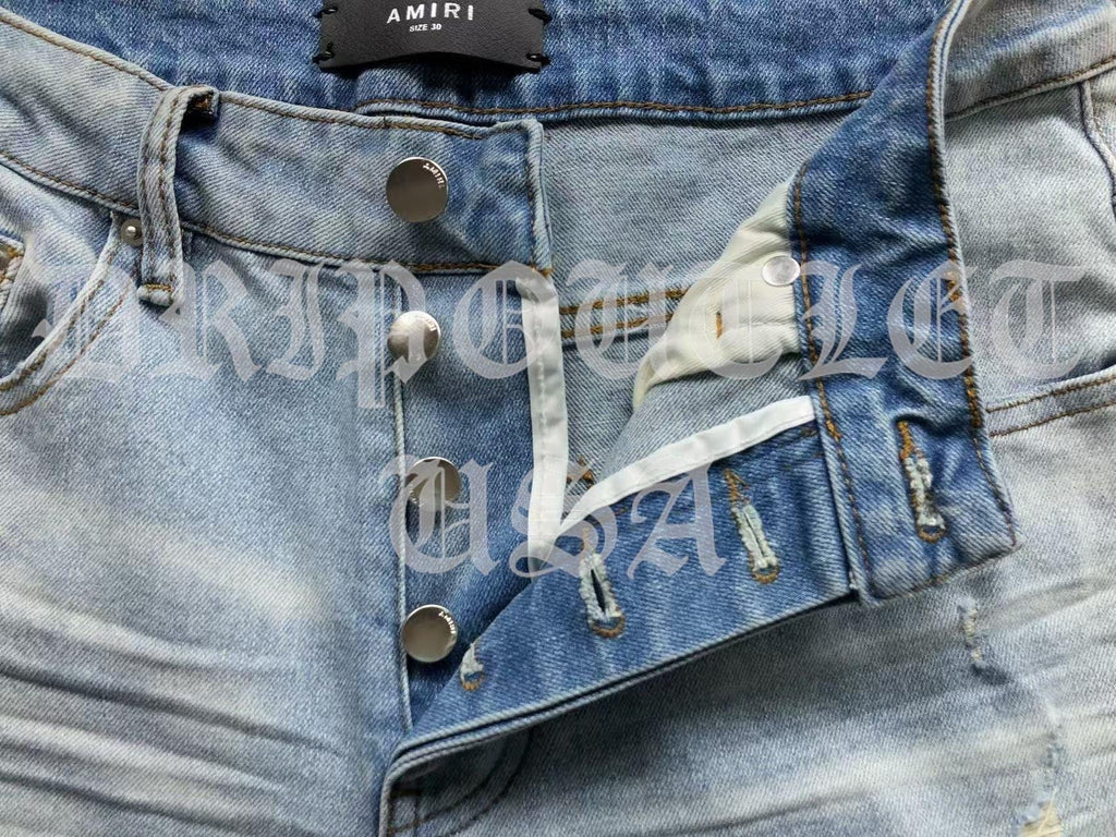 Amiri Blue Bleached Distressed Logo Skinny Jeans