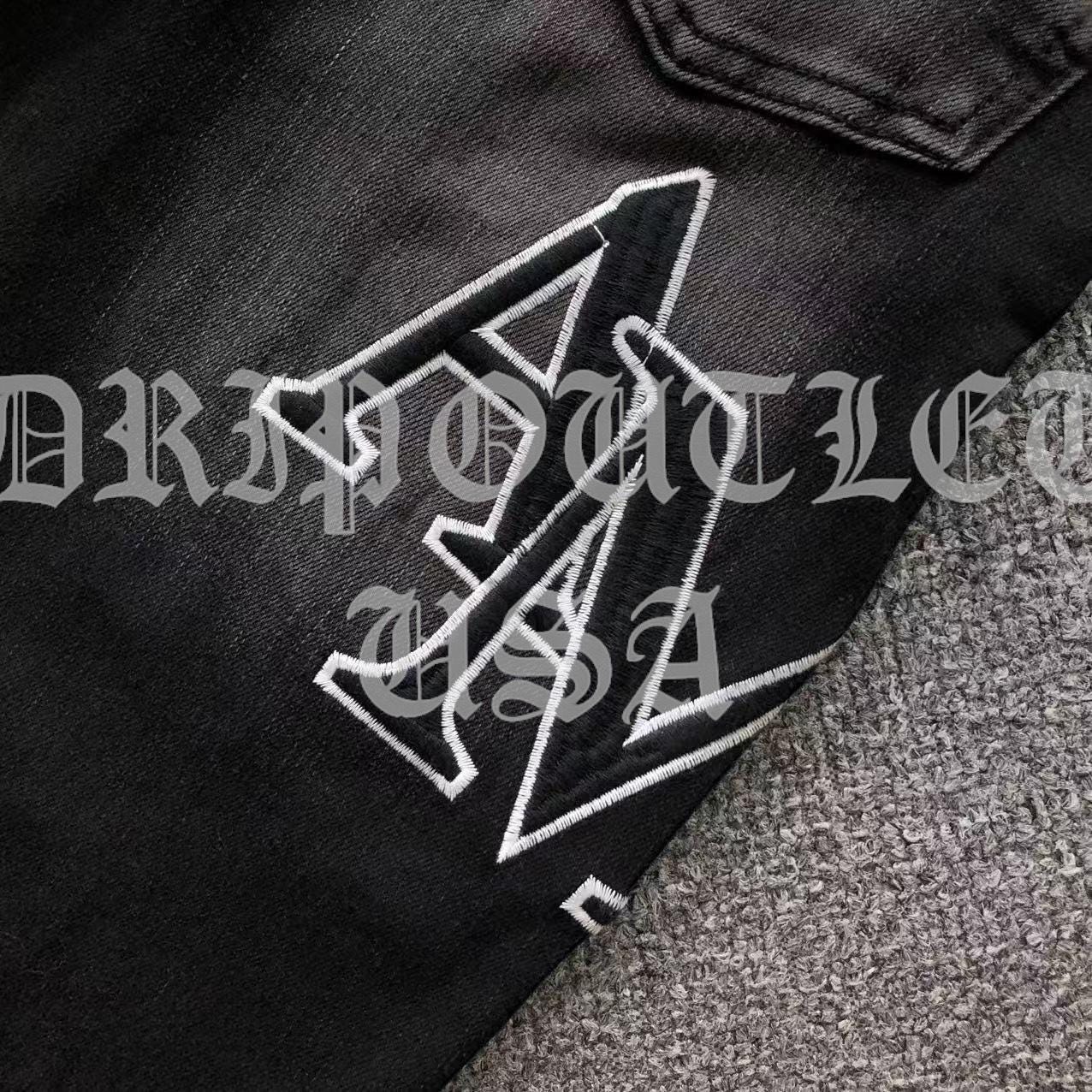 Amiri Black Distressed Logo Skinny Jeans