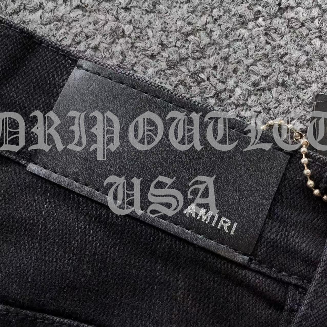 Amiri Black Distressed Logo Skinny Jeans