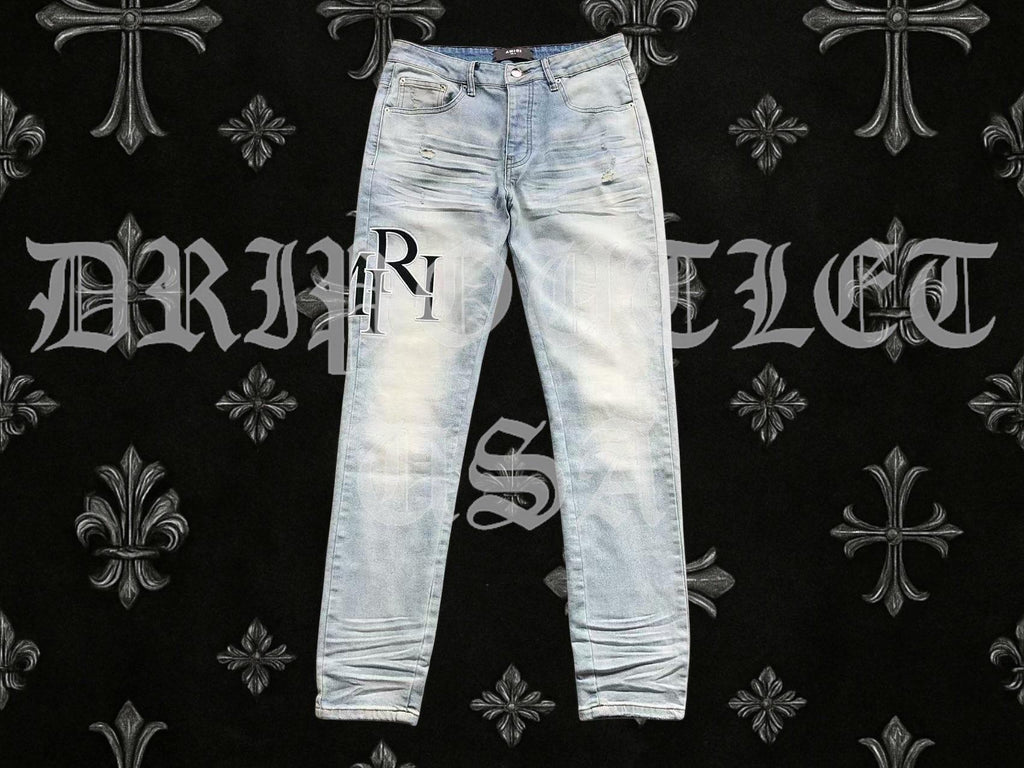 Amiri Blue Bleached Distressed Logo Skinny Jeans