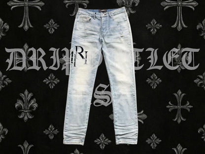 Amiri Blue Bleached Distressed Logo Skinny Jeans
