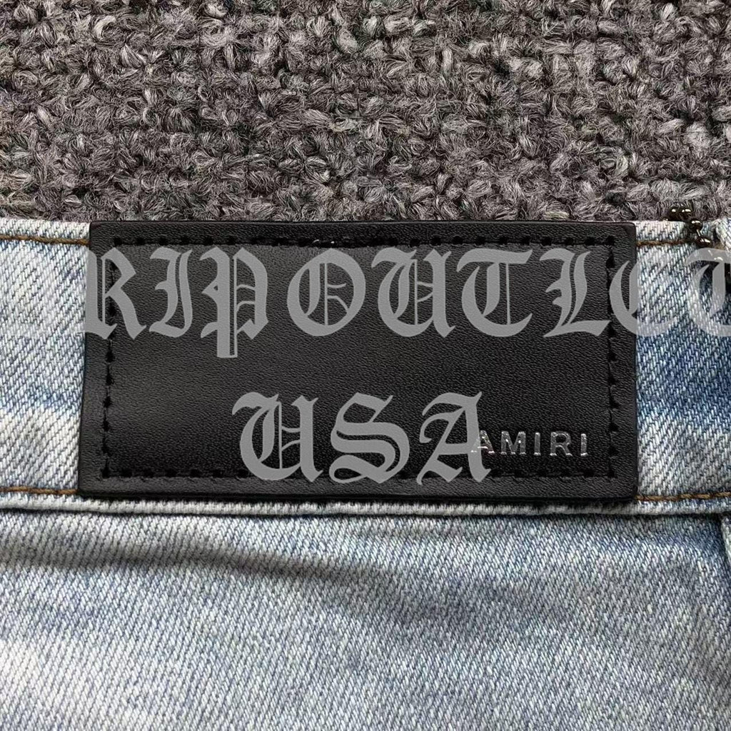 Amiri Blue Bleached Distressed Logo Skinny Jeans