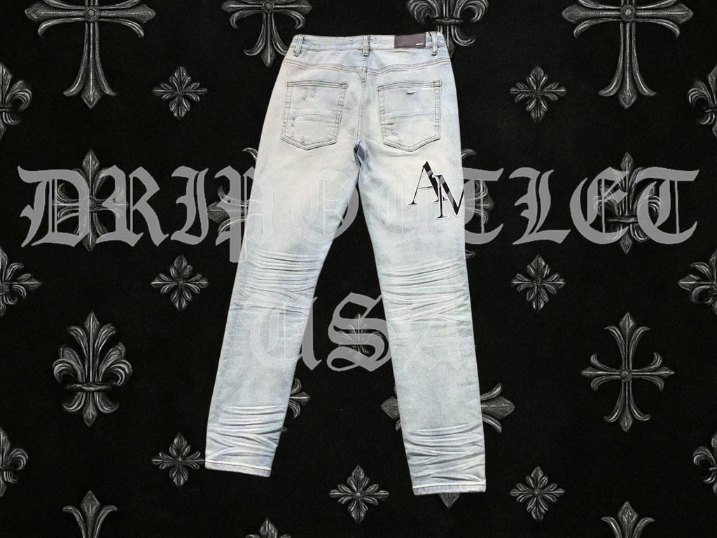 Amiri Blue Bleached Distressed Logo Skinny Jeans