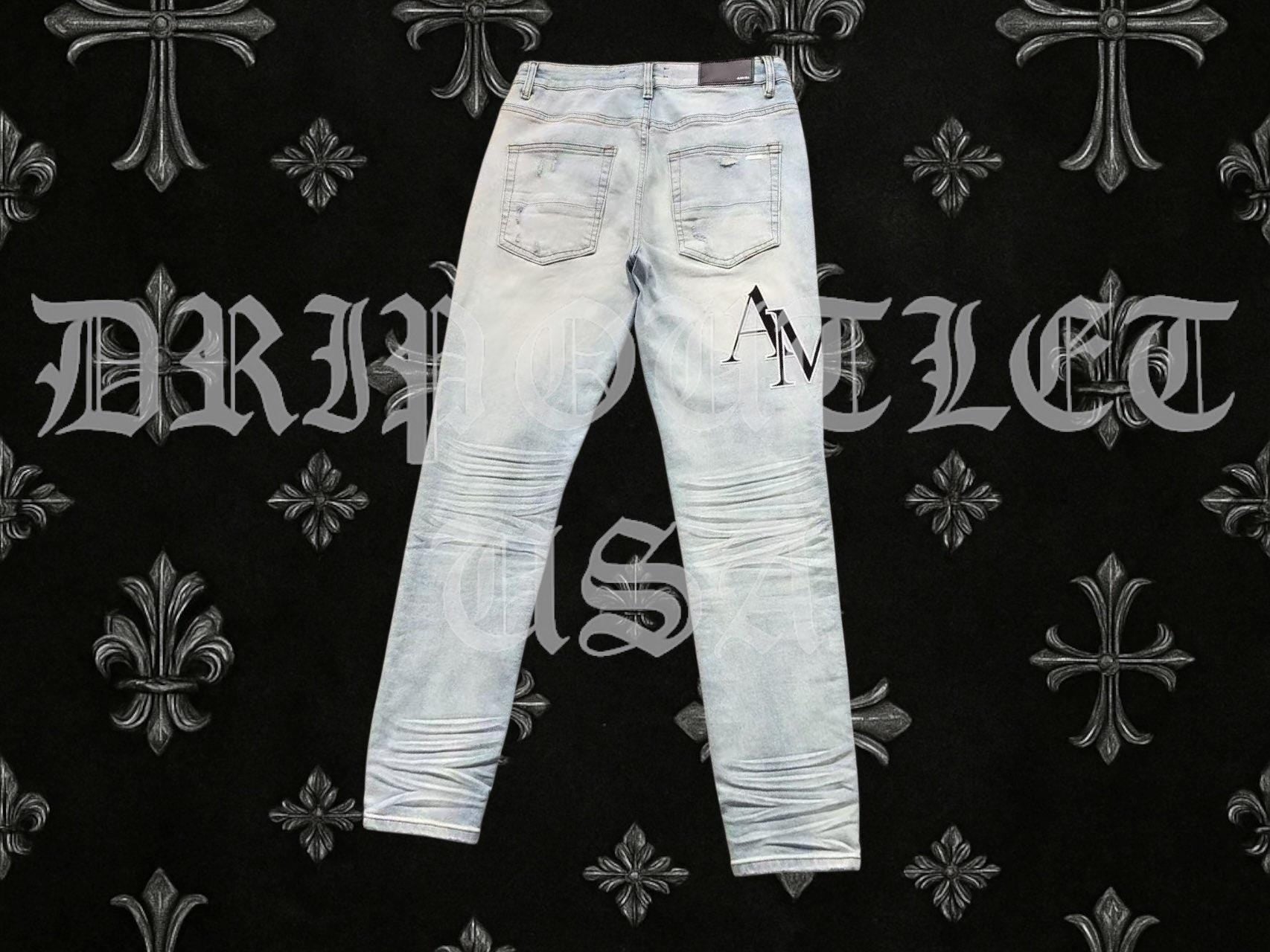 Amiri Blue Bleached Distressed Logo Skinny Jeans